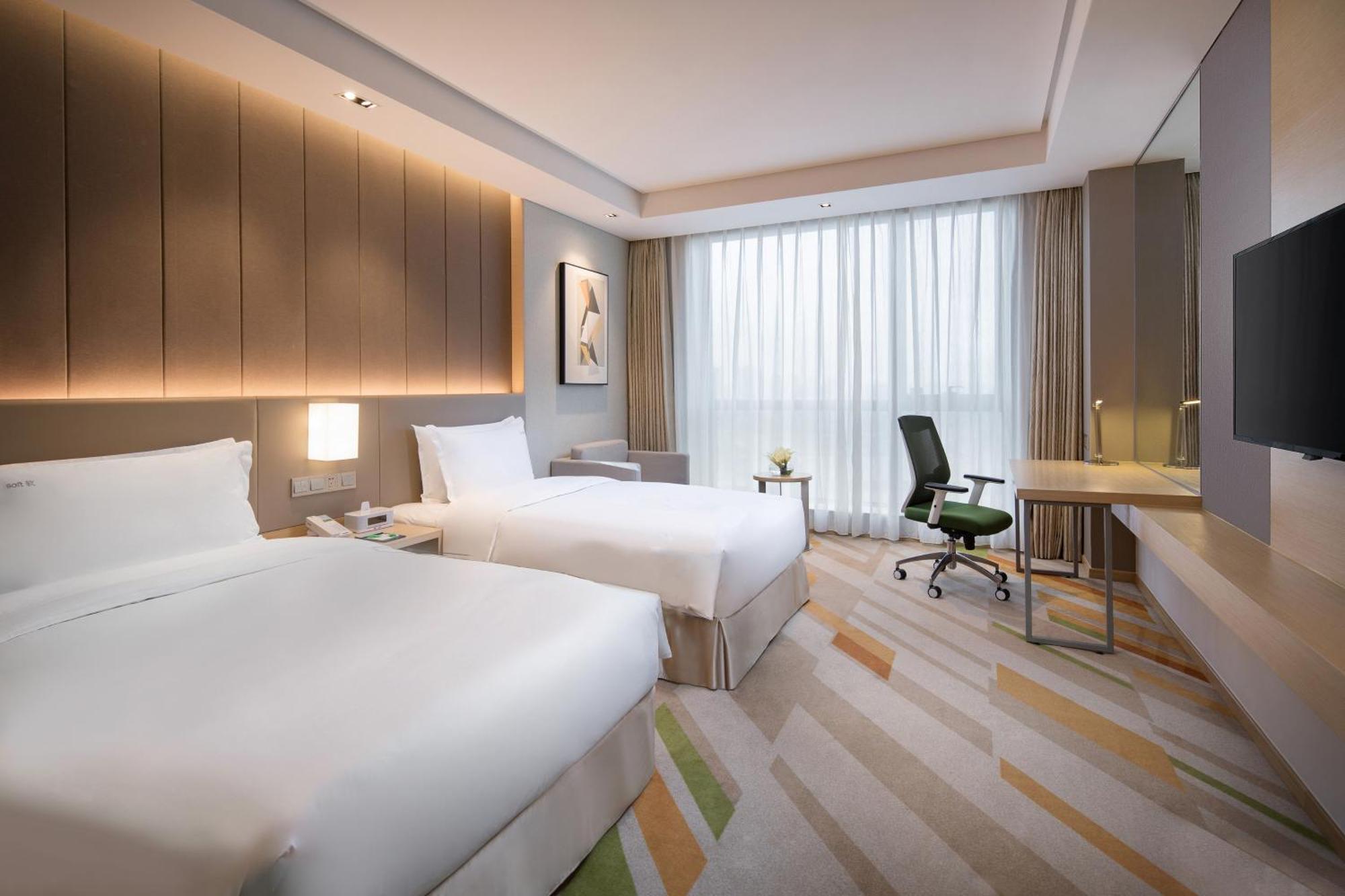 Holiday Inn Wuxi Taihu New City By Ihg Dış mekan fotoğraf